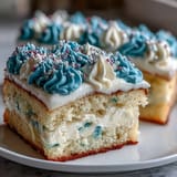 Moist vanilla sheet cake with vibrant buttercream frosting, featuring Class of 2026 piped in school colors for a festive touch.  